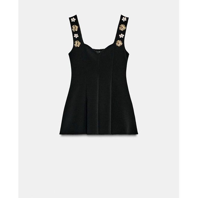Black Beaded Peplum Corset Top (Category: Blouses) located in Makati City. Submitted by unclutteredbyj (Listing ID 1466054358, Image 1). Description: .