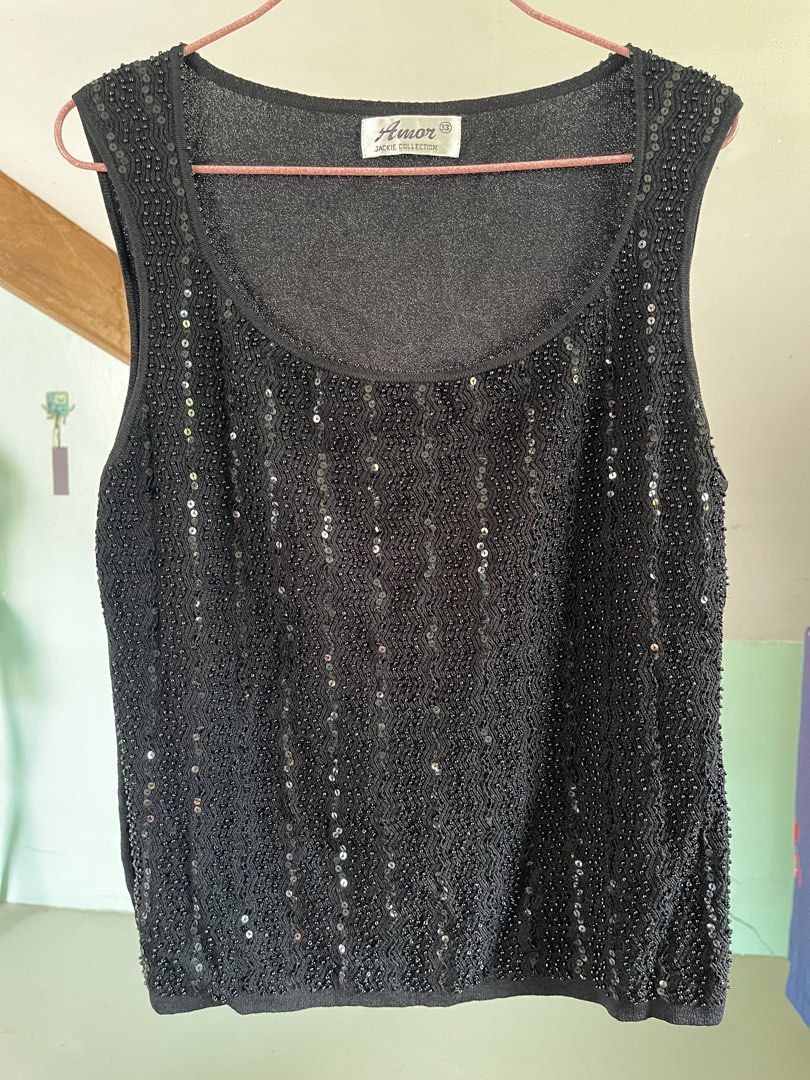 Black Beaded Sequin Top (Category: Sleeveless) located in Baybay. Submitted by shikita27906 (Listing ID 1466034805, Image 1). Description: - Brand/Model: Amor Jackie Collection - Size: S-M - Color: Black - Style: Sleeveless scoop neck tank top - Front Design: Covered in sparkly black beads and sequins with beaded neckline trim.