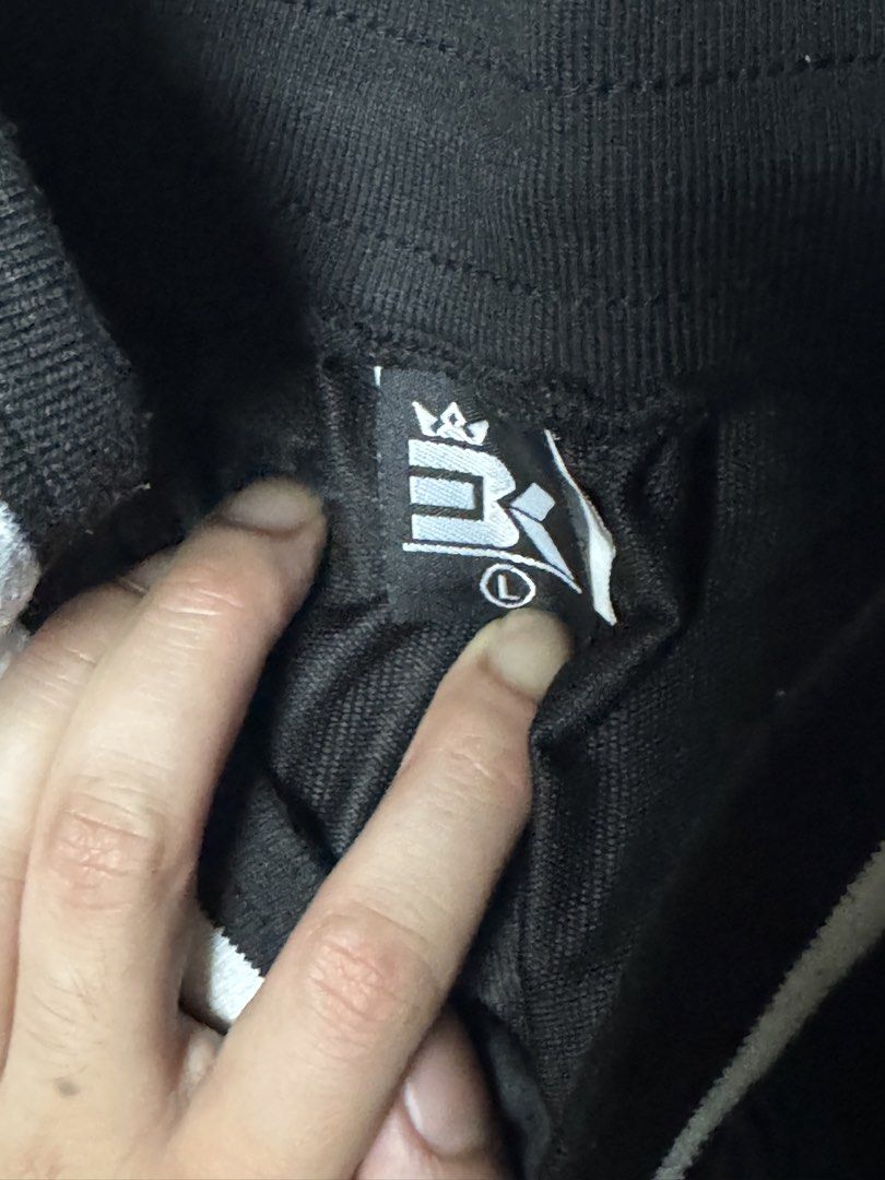 Black Cargo Joggers Size L with White Stripes (Category: Joggers) located in Manila. Submitted by seangoart (Listing ID 1466088891, Image 3). Description: Black cargo joggers with white striped cuffs and waist. Drawstring closure with metal tips. Zipper pockets on the front and utility cargo pockets on the sides. Size large. Casual street style pants..