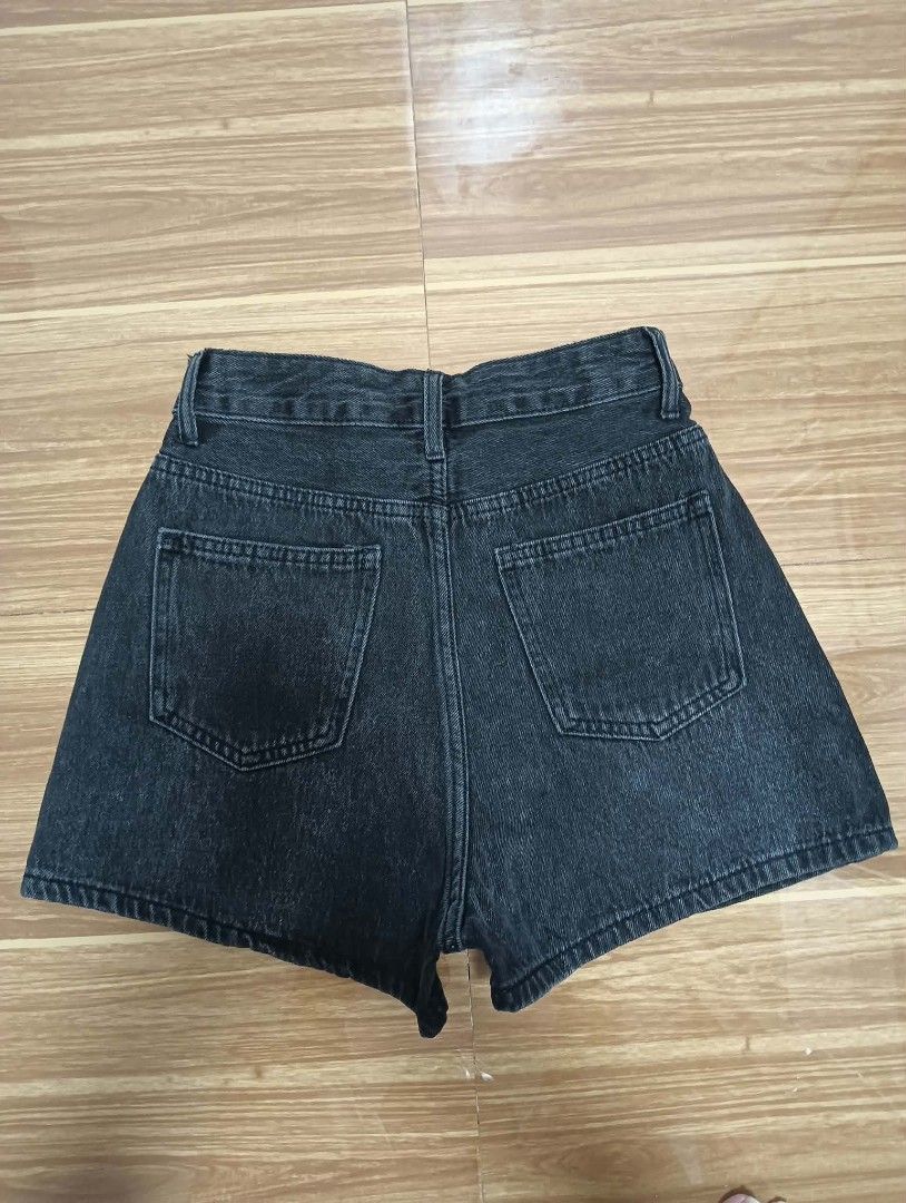 Black Denim Button-Front Skort Shorts Size 24-25 (Category: Shorts) located in Manila. Submitted by ac_dl (Listing ID 1466110534, Image 2). Description: - Style: Trendy washed black denim skort - Size: Tag reads 24-25 - Details: Front button-up closure with metallic buttons, double front pockets, and two clean back patch pockets - Versatility: Great casual piece that pairs easily with tees and daily tops - Condition: Excellent for everyday outfit