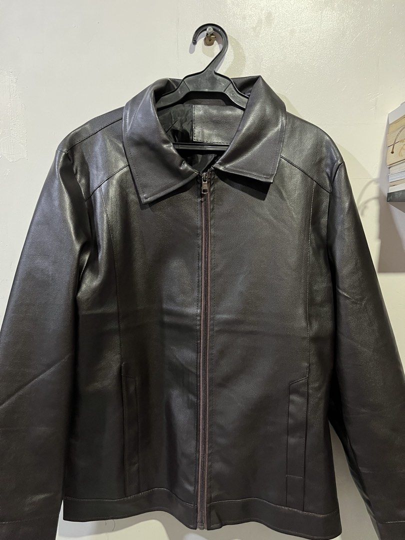 Brown Leather Jacket Size L (Category: Coats, Jackets and Outerwear) located in Manila. Submitted by updilimangaragesale (Listing ID 1466147065, Image 3). Description: - Color: Black - Material: Faux leather with smooth inner lining - Size: L - Features: Front zipper closure, classic fold-down collar, and functional side pockets - Condition: Clean, minimal signs of wear - Perfect for daily wear, riding, or night outs!.