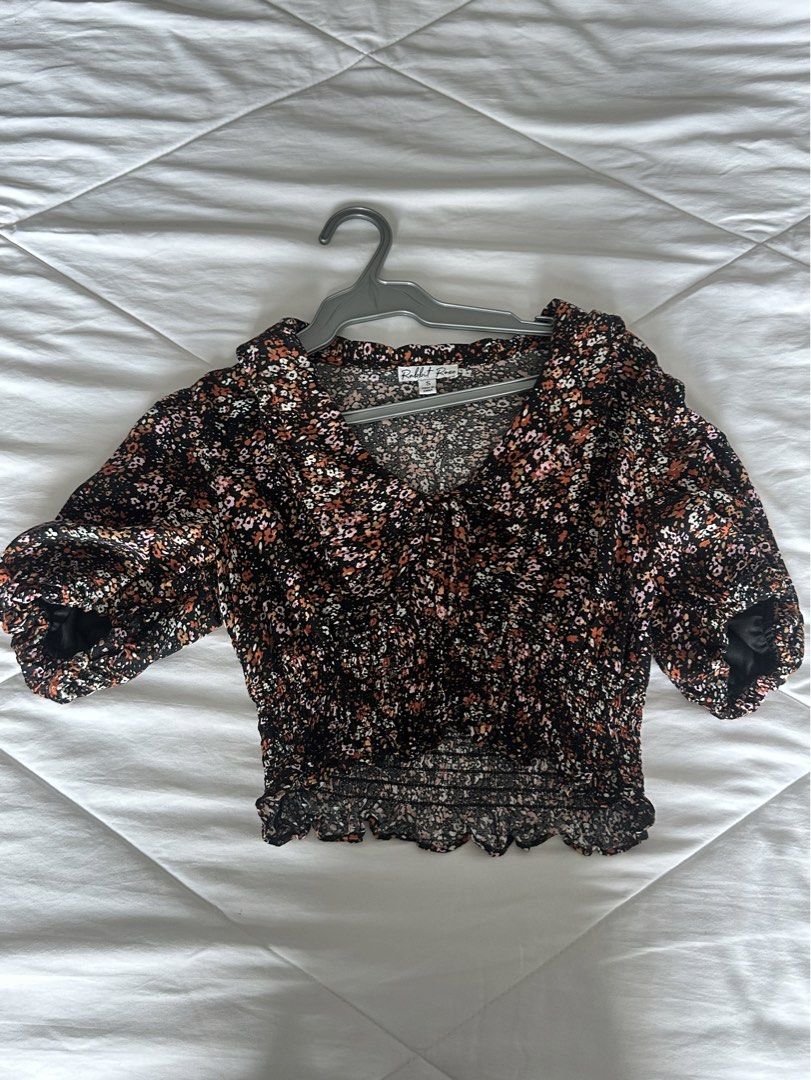 Black Floral Smocked Blouse (Category: Blouses) located in Manila. Submitted by harleyscloset (Listing ID 1466070858, Image 1). Description: - Black floral print - Long puff sleeves - V-neckline with tie detail - Smocked bodice - Fitted cropped silhouette .