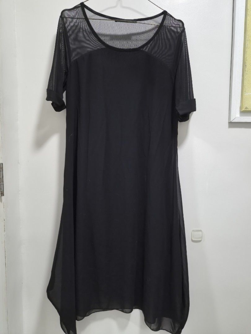 Black mesh overlay short sleeve dress (Category: Dresses) located in Quezon City. Submitted by corrnic (Listing ID 1466042787, Image 2). Description: - Color: Black - Style: Short sleeve dress with relaxed fit and scoop neckline - Design: Sheer mesh top layer with a solid inner slip layer - Fabric: Lightweight and sheer - Condition: Clean and ready to wear.