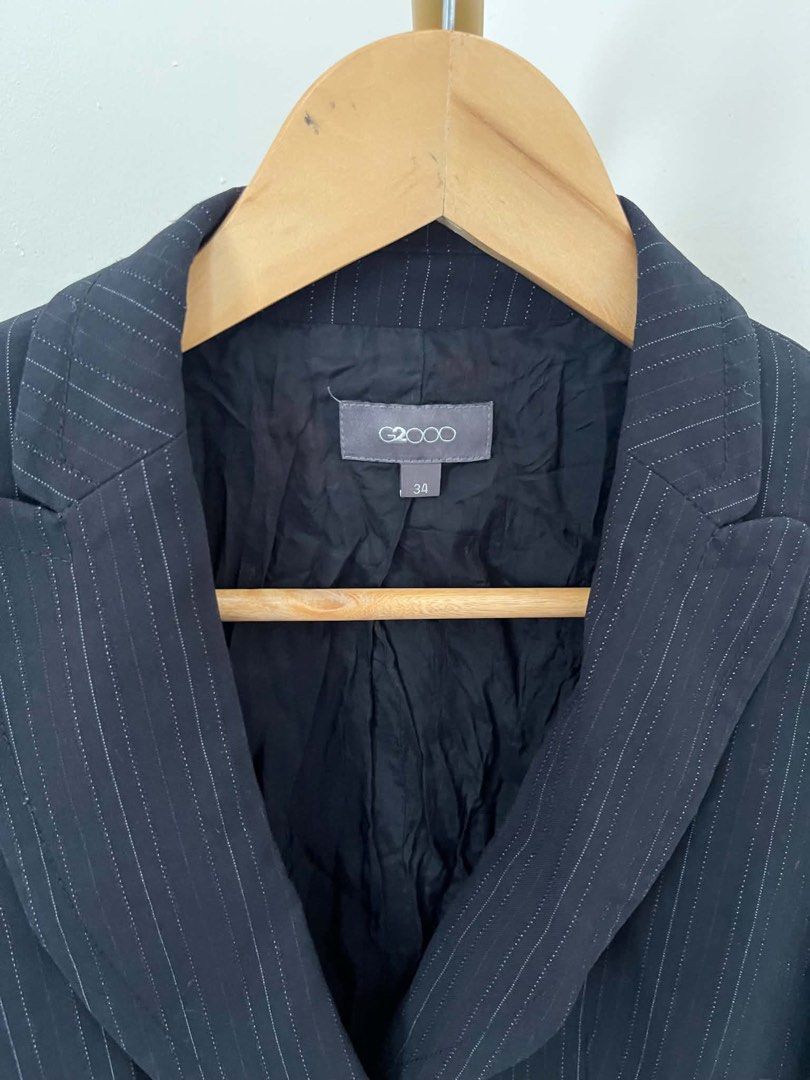 Black Pinstriped Blazer (Category: Coats, Jackets and Outerwear) located in Mexico. Submitted by studioleraph (Listing ID 1466051348, Image 2). Description: Measurements: Shoulder: 12.5 Chest: 15 Length: 21.5 Arm Hole: 12 🛍️ Perfect for your personal wardrobe 🫶 👗 The actual item being sold is the original garment shown in the product photos. Small differences in fit, drape, color, texture, or details may occur. 💌 Condition: • Preloved; Please