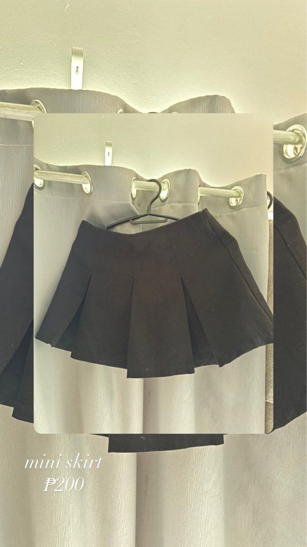 Black pleated mini skirt (Category: Skirts) located in Makati City. Submitted by jrnhnnh3047116 (Listing ID 1466026744, Image 1). Description: - Color: Black - Style: Pleated mini skirt, short length - Design: Minimalist and clean look - Versatility: Easy to pair with tees, sweaters, or blouses - Condition: Brand new / Great wardrobe basic.