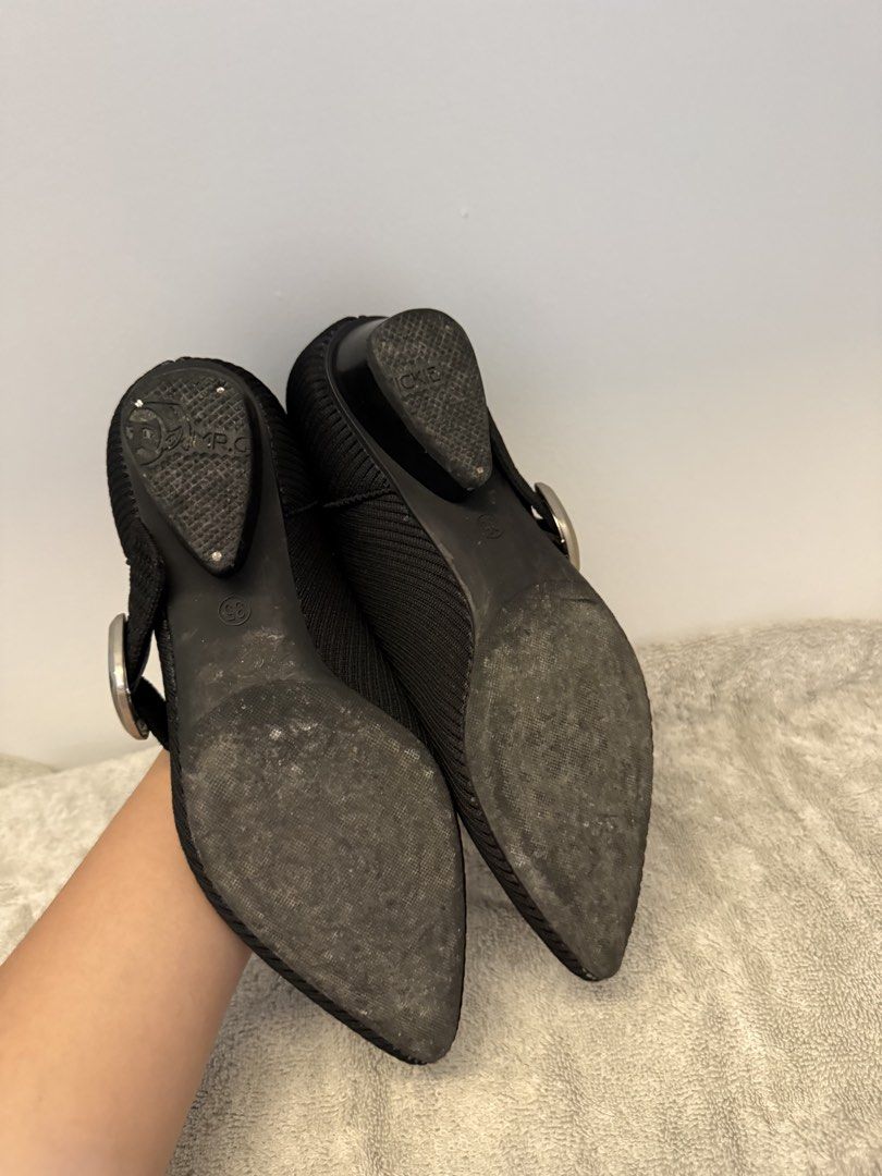 Black Pointed Toe Knit Mary Jane Flats Size 35 (Category: Flats & Sandals) located in Santa Rosa. Submitted by alyssa21 (Listing ID 1465954994, Image 3). Description: - Color & Material: Black with a stylish textured knit - Design: Mary Jane style with an adjustable silver buckle strap - Heel: Comfortable low block heel for subtle lift - Size: Marked Size 35 on the bottom - Condition: Soles show minor wear from walking outside, still in great wea