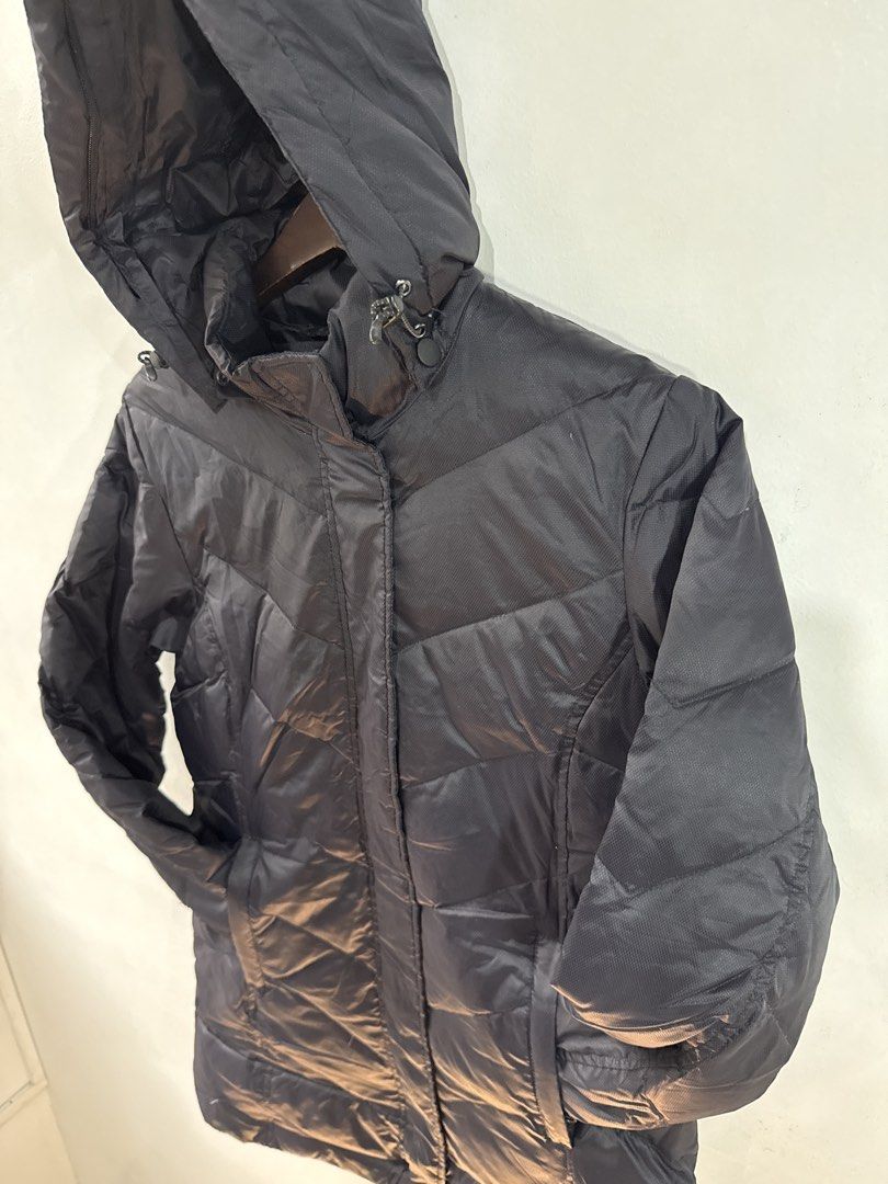 Black Waterproof Winter Jacket with detachable hood (Category: Coats, Jackets and Outerwear) located in Quezon City. Submitted by dropdeadprices (Listing ID 1466022111, Image 2). Description: - Color: Black - Pattern: Chevron stitching across chest and back - Material: Water-resistant - Features: Built-in hood, front pockets, and zip front with protective flap - Length: Mid-length for extra coverage against the cold 32 inches long x 20 inches wid