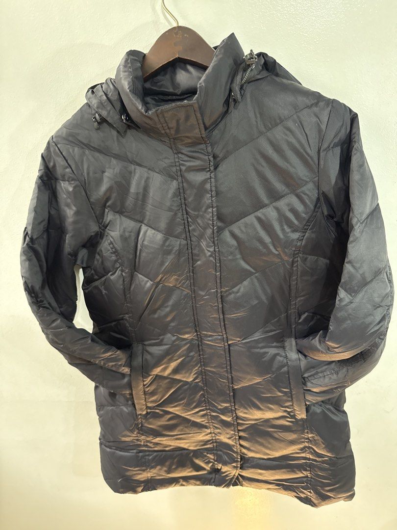 Black Waterproof Winter Jacket with detachable hood (Category: Coats, Jackets and Outerwear) located in Quezon City. Submitted by dropdeadprices (Listing ID 1466022111, Image 3). Description: - Color: Black - Pattern: Chevron stitching across chest and back - Material: Water-resistant - Features: Built-in hood, front pockets, and zip front with protective flap - Length: Mid-length for extra coverage against the cold 32 inches long x 20 inches wid