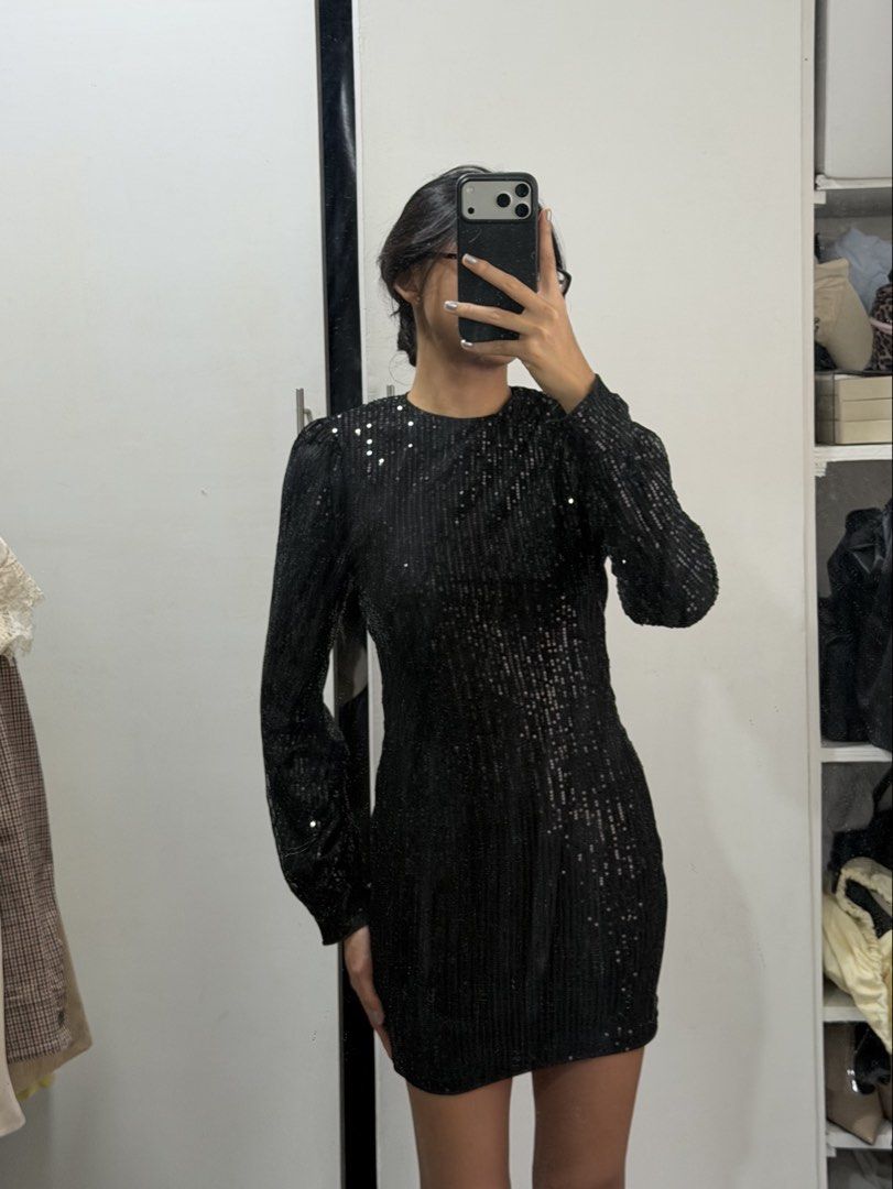 Black Sequin backless dress (Category: Dresses) located in Pasig City. Submitted by miss_abuelita (Listing ID 1465983772, Image 2). Description: s on tag but best fits xs for height best fits 5’5 below length 30” bust 32” stretchable material sequins.