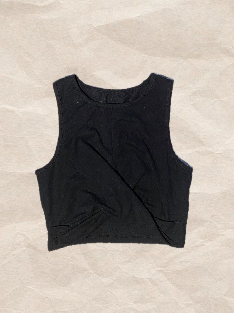 Black Twist Front Crop Top (Category: Sleeveless) located in Rizal. Submitted by pcesspscl145 (Listing ID 1466034558, Image 1). Description: - Color: Black - Size: Medium (tag inside collar) - Yoga Top.