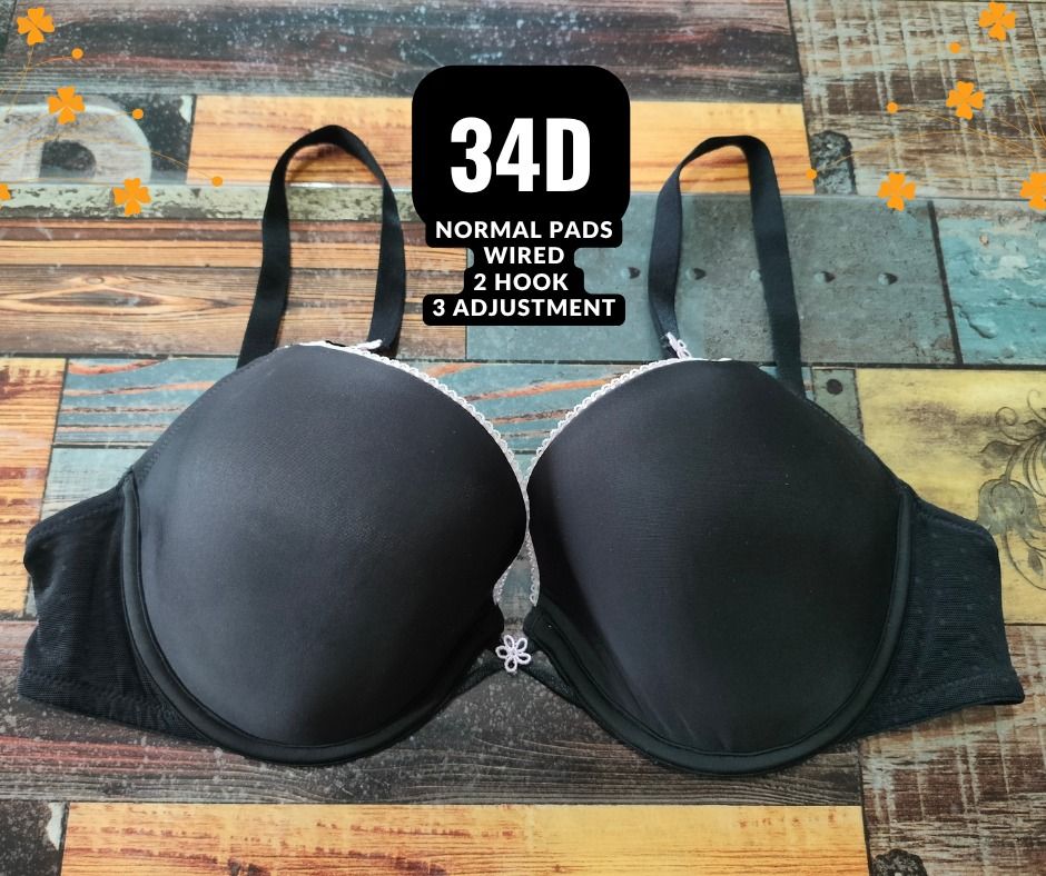 Black Wired Bra Size 34D Normal Pads (Category: Undergarments & Loungewear) located in Manila. Submitted by siashop. (Listing ID 1465989923, Image 1). Description: - Size: 34D - Color: Classic black with white trim and a small flower charm - Support: Underwired with normal padding for everyday comfort - Closure: Two-hook back closure with three adjustable settings - Straps: Fully adjustable - Condition: Clean, fresh, and ready to wear.