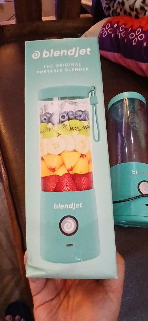 BlendJet 2 Portable Blender (Category: Juicers, Blenders & Grinders) located in Marikina City. Submitted by darthvader888 (Listing ID 1466072143, Image 2). Description: - Authentic teal BlendJet portable blender - Includes original box and USB-C charging cable - 16 oz capacity jar with clear measurement markings - Powerful 6-point stainless steel blade with TurboJet tech - Simple one-button operation featuring pulse and lock modes - Ideal for smo