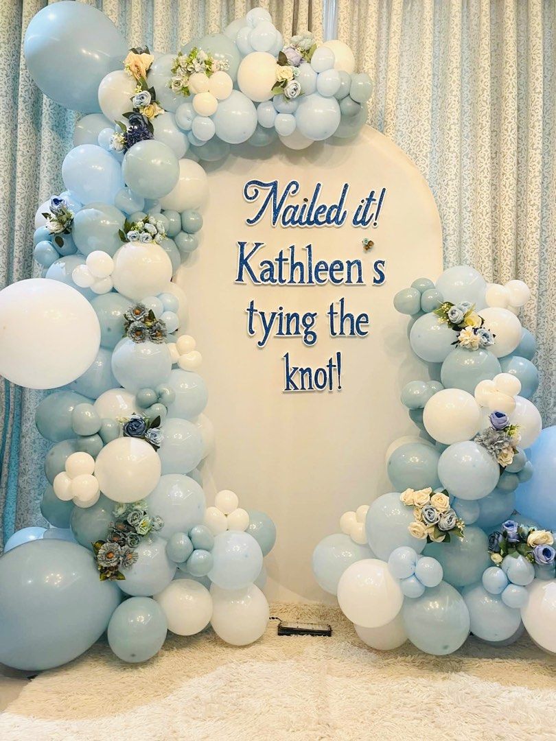 Blue and white balloon arch setup with arch backdrop (Category: Occasions & Party Supplies) located in Quezon City. Submitted by kristinecarranza (Listing ID 1466091845, Image 3). Description: - Stunning balloon party arch setup - Accented with elegant roses - Includes rounded backdrop panel with custom lettering - Ideal for engagement parties, bridal showers, birthdays and weddings - Perfect photo backdrop to make your celebration special .
