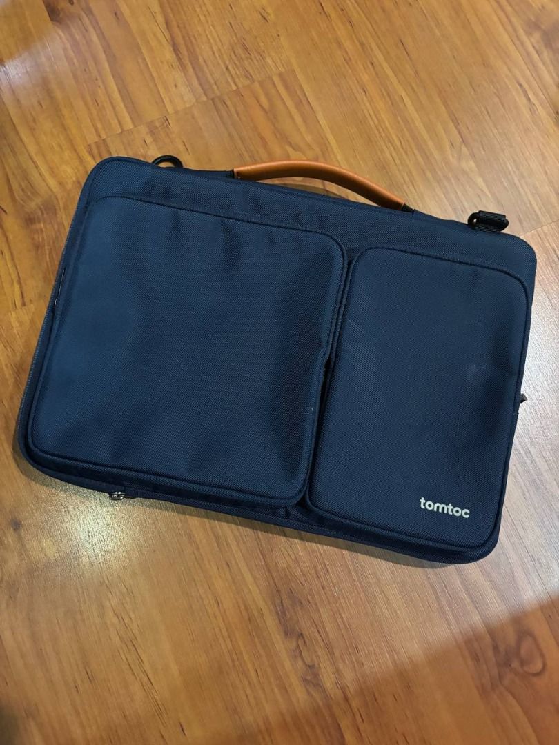 Blue Laptop Bag with Brown Leather Handle (Category: Laptop Bags & Sleeves) located in Caloocan City. Submitted by wildbird_086d1b (Listing ID 1466071981, Image 1). Description: Defender A42 Messenger Bag 14" - Navy Blue - Color: Navy blue fabric with contrasting tan brown leather handle - Slim and professional profile, ideal for daily commute or office use - Equipped with D-rings on the corners for attaching an optional shoulder strap - Smooth-w