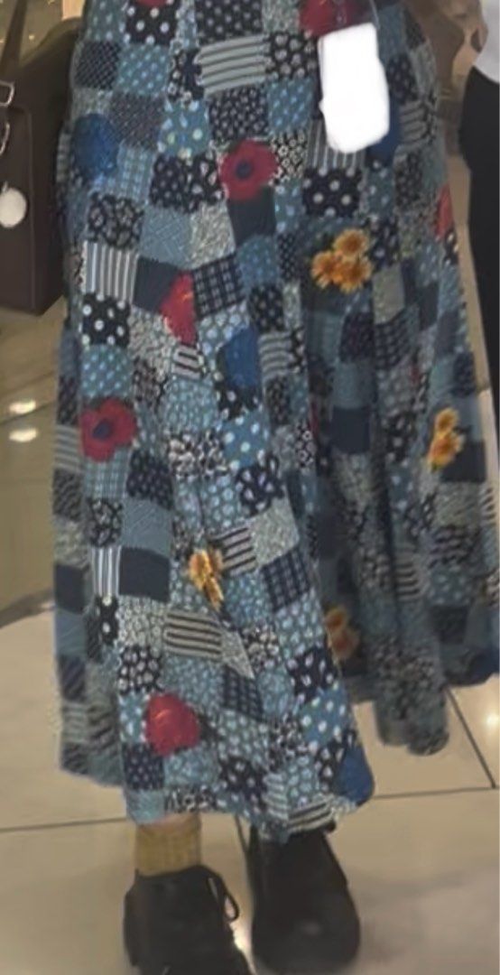 Blue Patchwork Floral Maxi Skirt (Category: Skirts) located in Quezon City. Submitted by jreesey (Listing ID 1465987308, Image 2). Description: Blue Patchwork Maxi Skirt with Flower Design - Purchased on this app in 2024 - The pattern design seems to be more “printed” and flat, NOT manually stitched together like other common patchwork clothes - Has slits below - Says L on tag but prev seller said that it’s more of a free size because of the gart