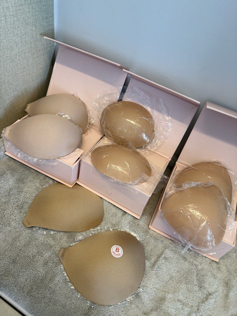 BOOMBA Inserts Multi-box Set Size B (Category: Undergarments & Loungewear) located in Santa Rosa. Submitted by alyssa21 (Listing ID 1465953979, Image 2). Description: - Brand: BOOMBA - Item: Adhesive bra inserts - Shade: Nude - Condition: Brand new and lightly used extras, some still in protective plastic with original pink storage boxes - Features: Great for boosting cleavage and adding volume under low-cut outfits - Reason for selling: Declutte