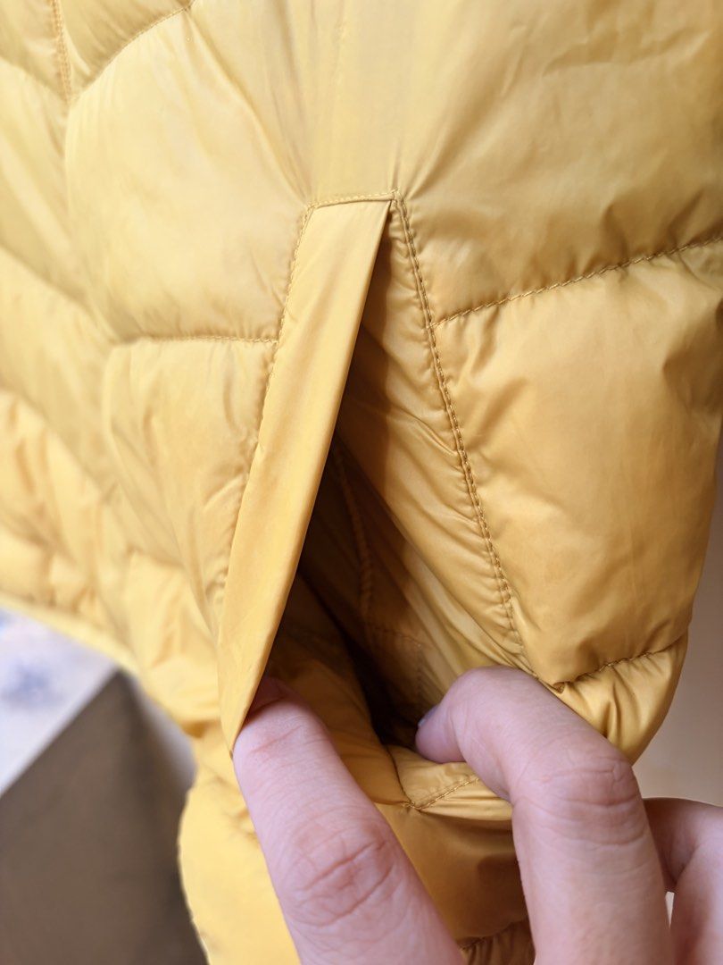 Bossini Yellow Puffer Jacket Size 130 (Category: Babies & Kids Fashion) located in Las Pinas. Submitted by ramech0105 (Listing ID 1465963402, Image 3). Description: - Brand: Bossini - Color: Bright yellow - Size: 130/68 - Design: Padded quilted puffer jacket with zip-up front and attached hood - Pockets: Two front pockets - Condition: Clean exterior and lining, well kept, very warm for cold weather.