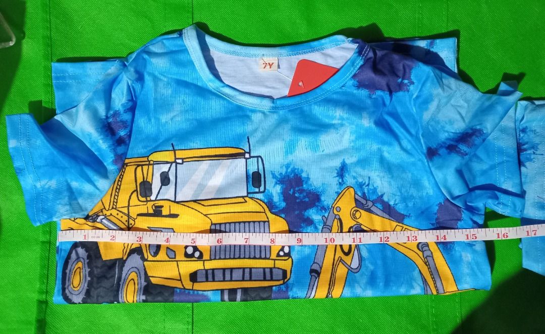 Boys Construction Trucks Print shorts Set Blue (Category: Babies & Kids Fashion) located in Quezon City. Submitted by macon0948 (Listing ID 1466034054, Image 2). Description: - Brand new with tag attached - Blue tie-dye set for boys (short-sleeve top and matchingshort) - Fun all-over print featuring yellow construction trucks, dump trucks, and excavators - Made with soft, comfortable fabric ideal for sleeping or lounging - Great gift for little v