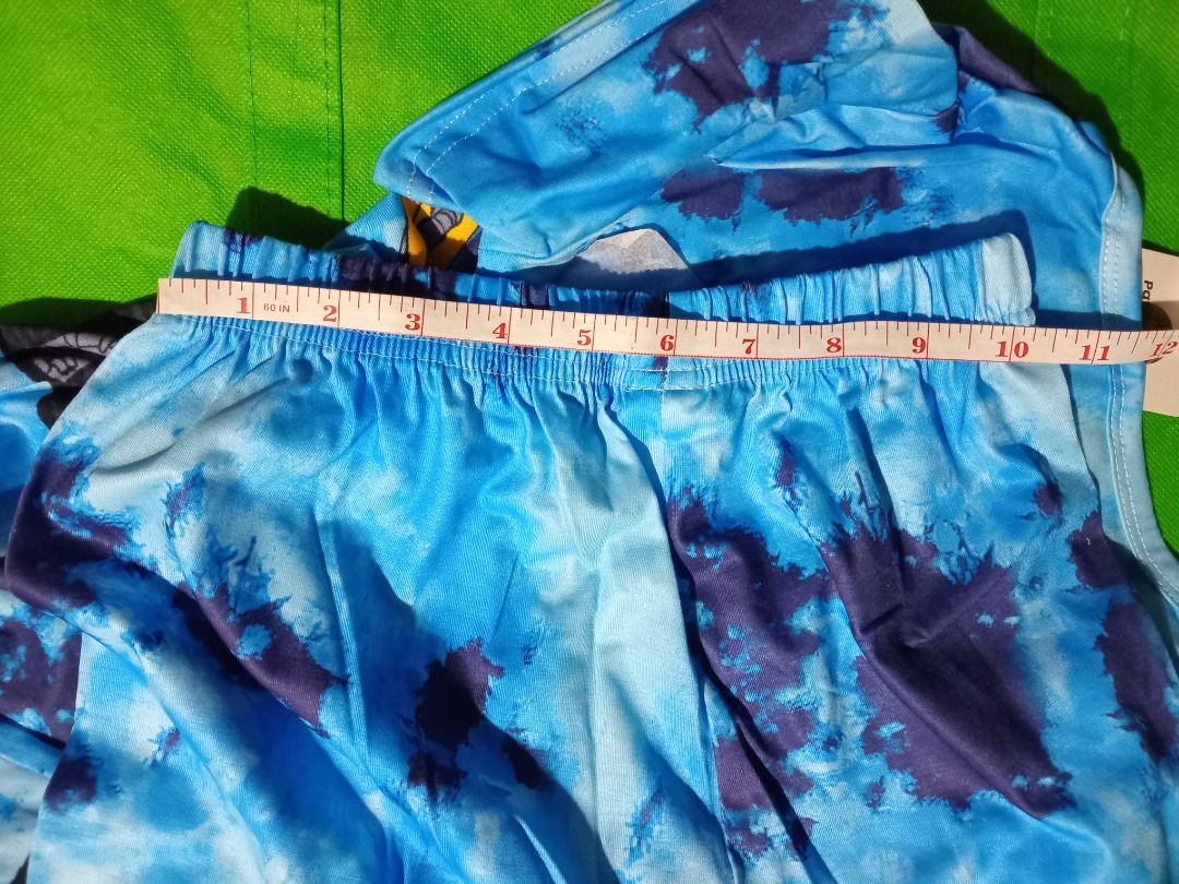 Boys Construction Trucks Print shorts Set Blue (Category: Babies & Kids Fashion) located in Quezon City. Submitted by macon0948 (Listing ID 1466034054, Image 3). Description: - Brand new with tag attached - Blue tie-dye set for boys (short-sleeve top and matchingshort) - Fun all-over print featuring yellow construction trucks, dump trucks, and excavators - Made with soft, comfortable fabric ideal for sleeping or lounging - Great gift for little v