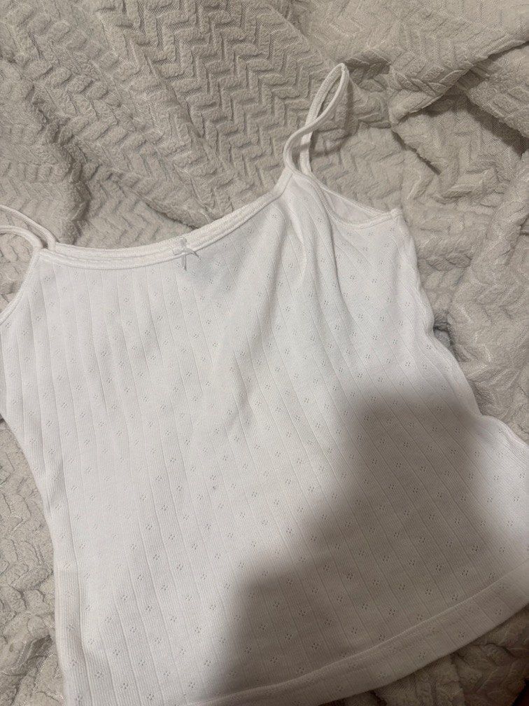 brandy melville pointelle tank top (Category: Others Tops) located in Manila. Submitted by flouriesie_ (Listing ID 1466101662, Image 1). Description: price is slightly negotiable if sure buyer ! rfs: slightly loose on me size: s can do ww thru pm mop: gcash only🤍.