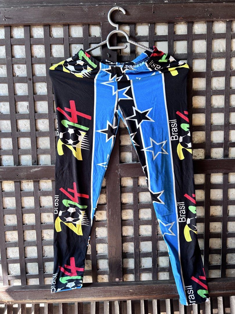 Brasil 2014 World Cup Printed Leggings (Category: Activewear) located in Makati City. Submitted by hzsans92 (Listing ID 1466104989, Image 1). Description: - Brasil 2014 World Cup themed leggings - Eye-catching design with black graphic sides and bright blue star center panels - Comfortable stretch material with a secure elastic waistband - Perfect for fitness, sports, or casual streetwear - Vibrant and fun sportswear piece.