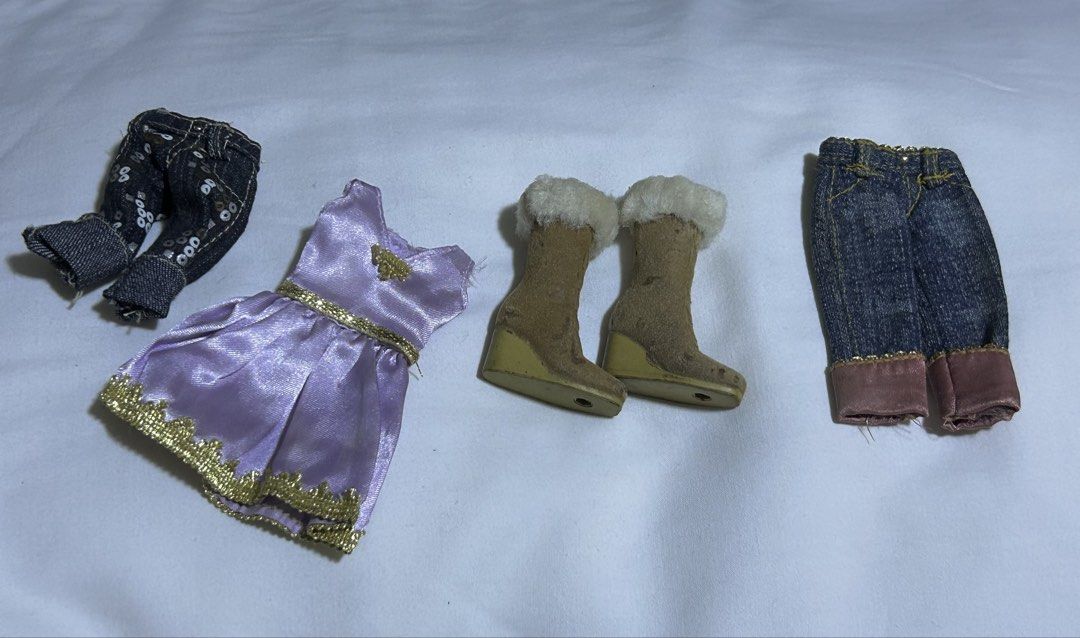 BRATZ CLOTHES SMALL SALE (desc) (Category: Kids Toys) located in Bulacan. Submitted by sweetdreamzcupid (Listing ID 1466046095, Image 2). Description: SMALL SALE! Bratz Clothes FBF Sasha Coat - 250 Rectangular Necklace - 250 Bratz Shades - 250 Pampered Pupz Yasmin Dress - 200 Step Out Jade Pants - 150 Campfire Yasmin/Cloe Boots - 200 Genie Magic Meygan Pants - 150.