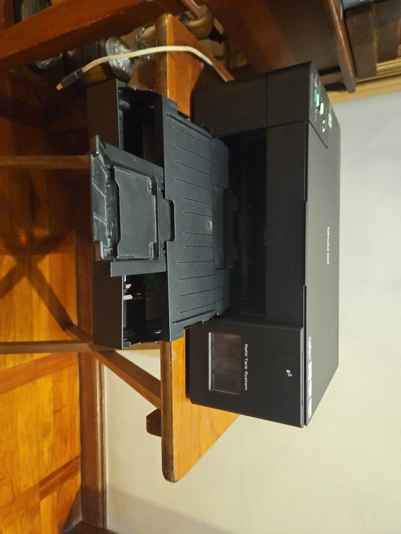 Brother DCP-T420W Refill Tank System Printer (Category: Printers, Scanners & Copiers) located in Quezon City. Submitted by edensc (Listing ID 1466071338, Image 3). Description: - Model: Brother DCP-T420W All-in-One Printer (Black) - System: Refill Tank System for low-cost, high-volume printing - Design: Compact desktop footprint with paper input tray and top-left control panel - Functions: Print, scan, and copy - Power: Standard cable connection 