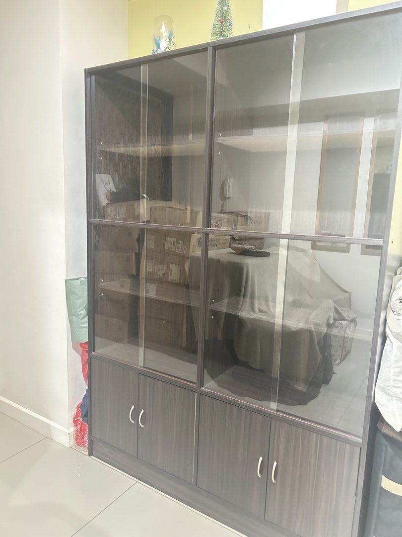 Brown 5 layer cabinet with glass sliding (Category: Shelves, Cabinets & Racks) located in Cebu City. Submitted by dylovely (Listing ID 1465979680, Image 1). Description: 5 layer brown cabinet with glass sliding cover Like new no flaws Location: CEBU Pickup and Lalamove .
