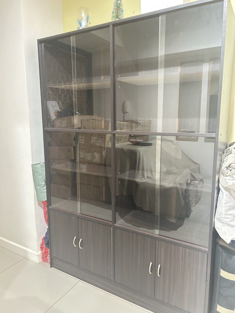 Brown 5 layer cabinet with glass sliding (Category: Shelves, Cabinets & Racks) located in Cebu City. Submitted by dylovely (Listing ID 1465979680, Image 2). Description: 5 layer brown cabinet with glass sliding cover Like new no flaws Location: CEBU Pickup and Lalamove .