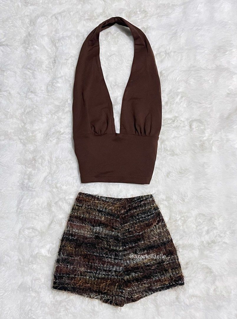 Brown halter top and tweed shorts set (Category: Sets or Coordinates) located in Navotas City. Submitted by azariellaelle (Listing ID 1466035312, Image 1). Description: - Chic brown halter top with deep V-neck and gathered cups - Textured tweed shorts featuring brown, black, and white horizontal stripes - Soft fuzzy fabric texture on the shorts - Versatile outfit combo for weekend brunch or a night out - Easy to mix and match with other closet st