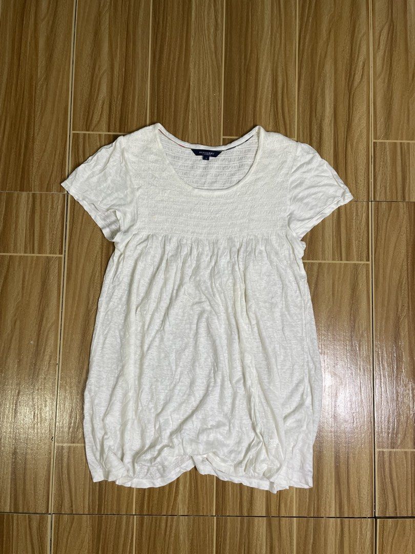 Burberry mini dress (Category: Activewear) located in Naga. Submitted by black-market00 (Listing ID 1466085769, Image 1). Description: Width 17 Lenght 28 No issue.