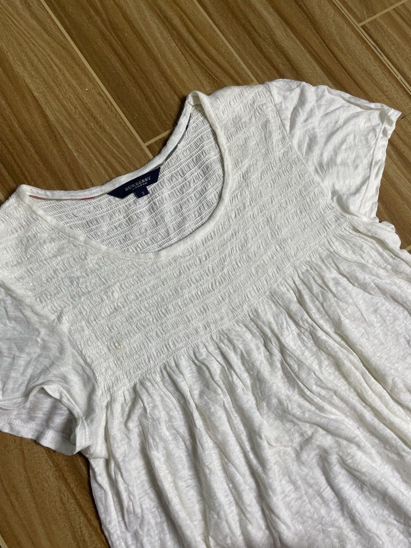 Burberry mini dress (Category: Activewear) located in Naga. Submitted by black-market00 (Listing ID 1466085769, Image 2). Description: Width 17 Lenght 28 No issue.