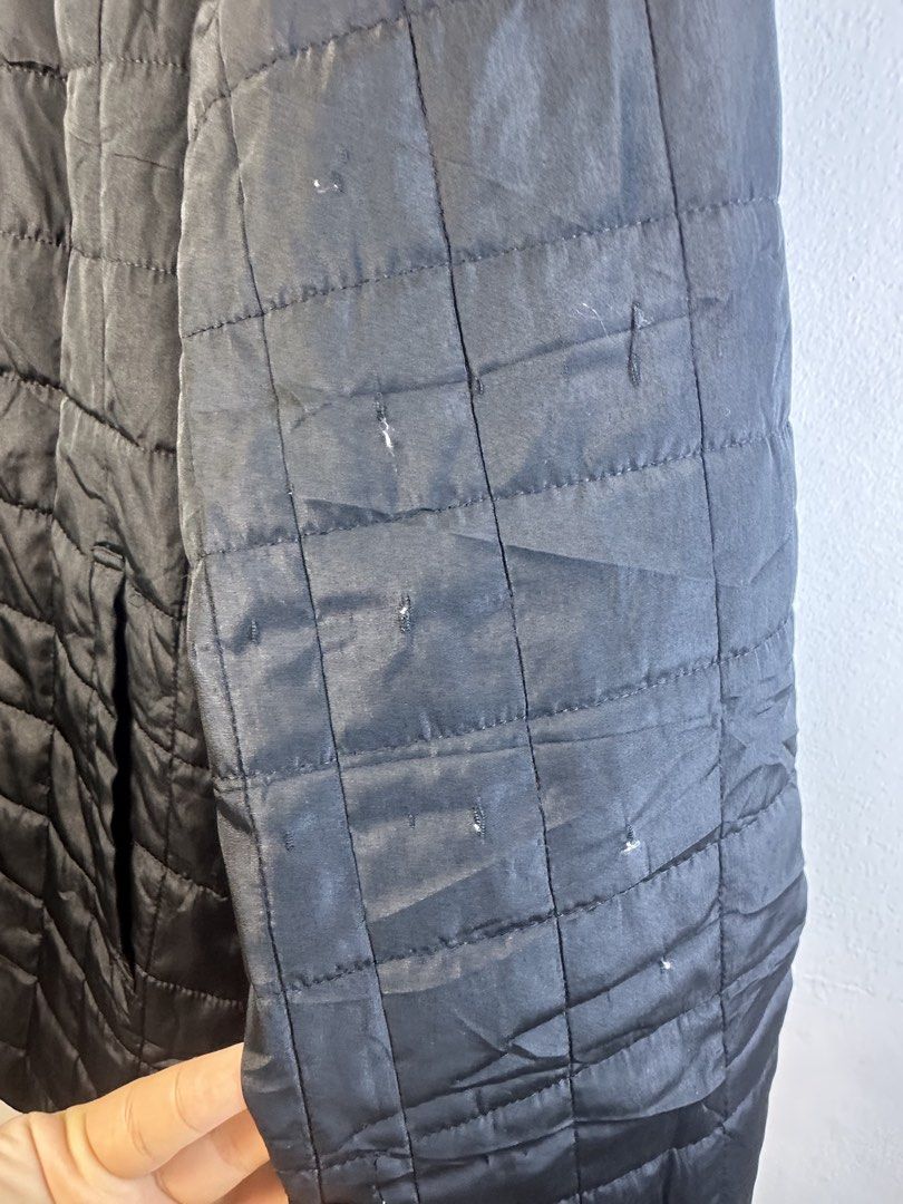 Burberry Quilted Black Jacket (Category: Coats, Jackets and Outerwear) located in Manila. Submitted by declutterpromax (Listing ID 1466025783, Image 3). Description: - black quilted Burberry jacket - Iconic classic check inner collar - Button-front closure with deep side pockets - Condition note: Noticeable wear, fraying, and small tears along the sleeves - Ideal DIY restoration project for vintage outerwear lovers - Selling as-is, message for in
