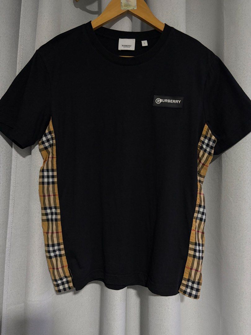 Burberry Vintage Logo Side Plaid Splicing Tee (Category: Tshirts & Polo Shirts ) located in Iloilo. Submitted by thethriftopia (Listing ID 1466087718, Image 1). Description: EXCELLENT CONDITION 🖤 SIZE: L COLOR RATE: 10/9.8 DIMES: W21 x L26 Wash and Wear Rewash if necessary Color may vary due to lighting Color rate indicated on description Disclaimer: Manage your expectations since this is a pre-loved item. Thank you so much. MOP GCASH and Bank T