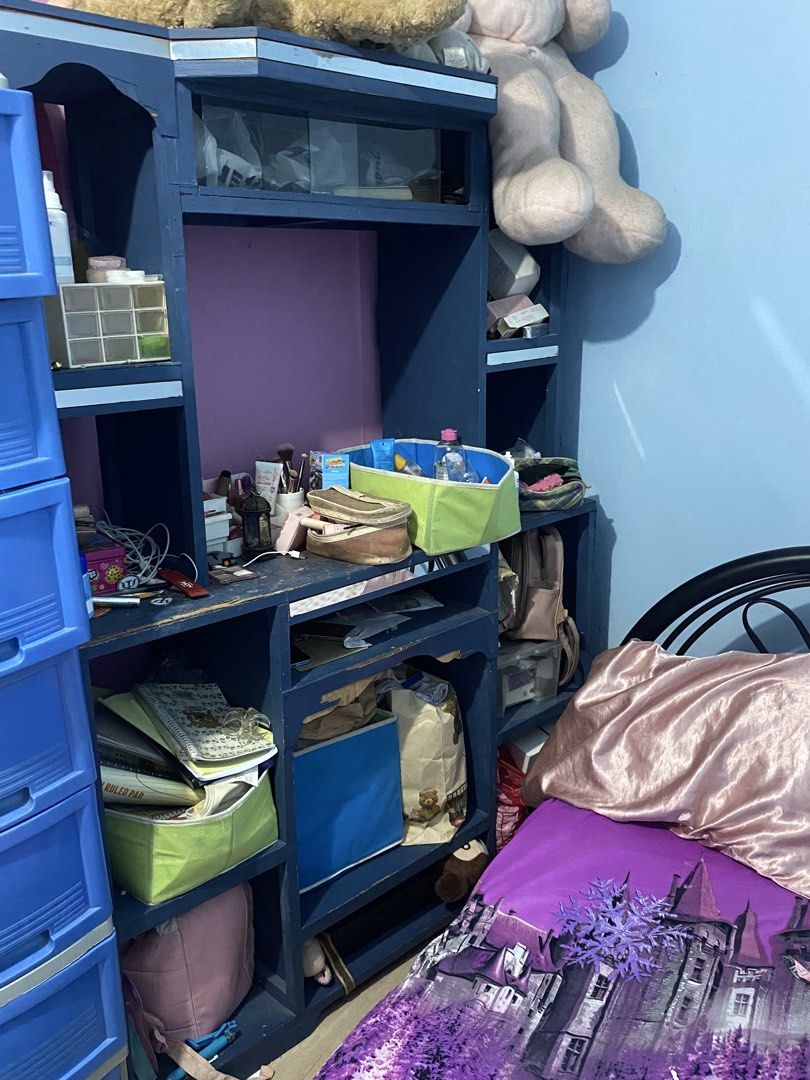 Cabinet and selves (Category: Shelves, Cabinets & Racks) located in Manila. Submitted by truefox.c4367a (Listing ID 1466027294, Image 1). Description: -2k each (negotiable if sure buyer) - Includes a sturdy blue wooden cabinet/shelf unit and a multi-tier blue Jolly plastic drawer cabinet - Features multiple open shelves, compartments, and pull-out drawers for maximum storage - Ideal for organizing clothes, books, school supplies, and personal ite