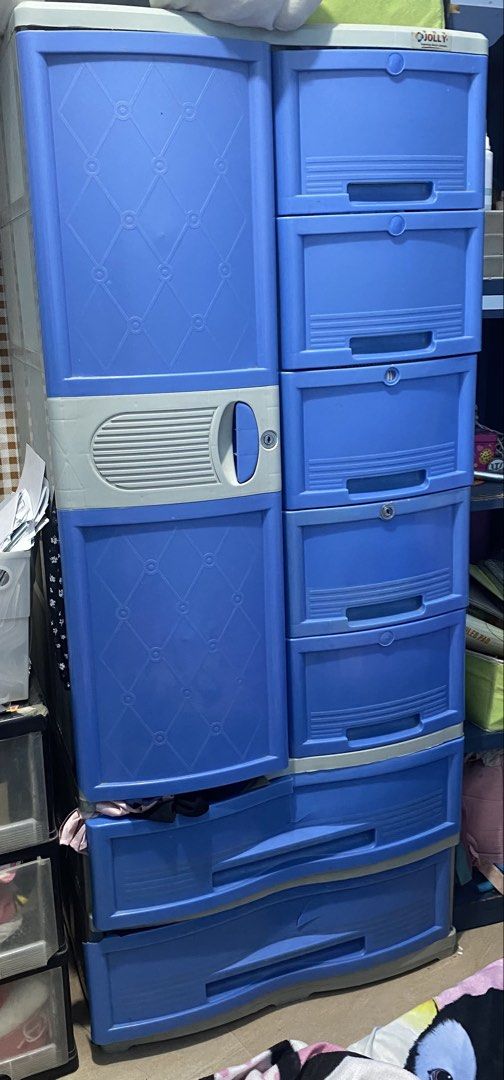 Cabinet and selves (Category: Shelves, Cabinets & Racks) located in Manila. Submitted by truefox.c4367a (Listing ID 1466027294, Image 2). Description: -2k each (negotiable if sure buyer) - Includes a sturdy blue wooden cabinet/shelf unit and a multi-tier blue Jolly plastic drawer cabinet - Features multiple open shelves, compartments, and pull-out drawers for maximum storage - Ideal for organizing clothes, books, school supplies, and personal ite