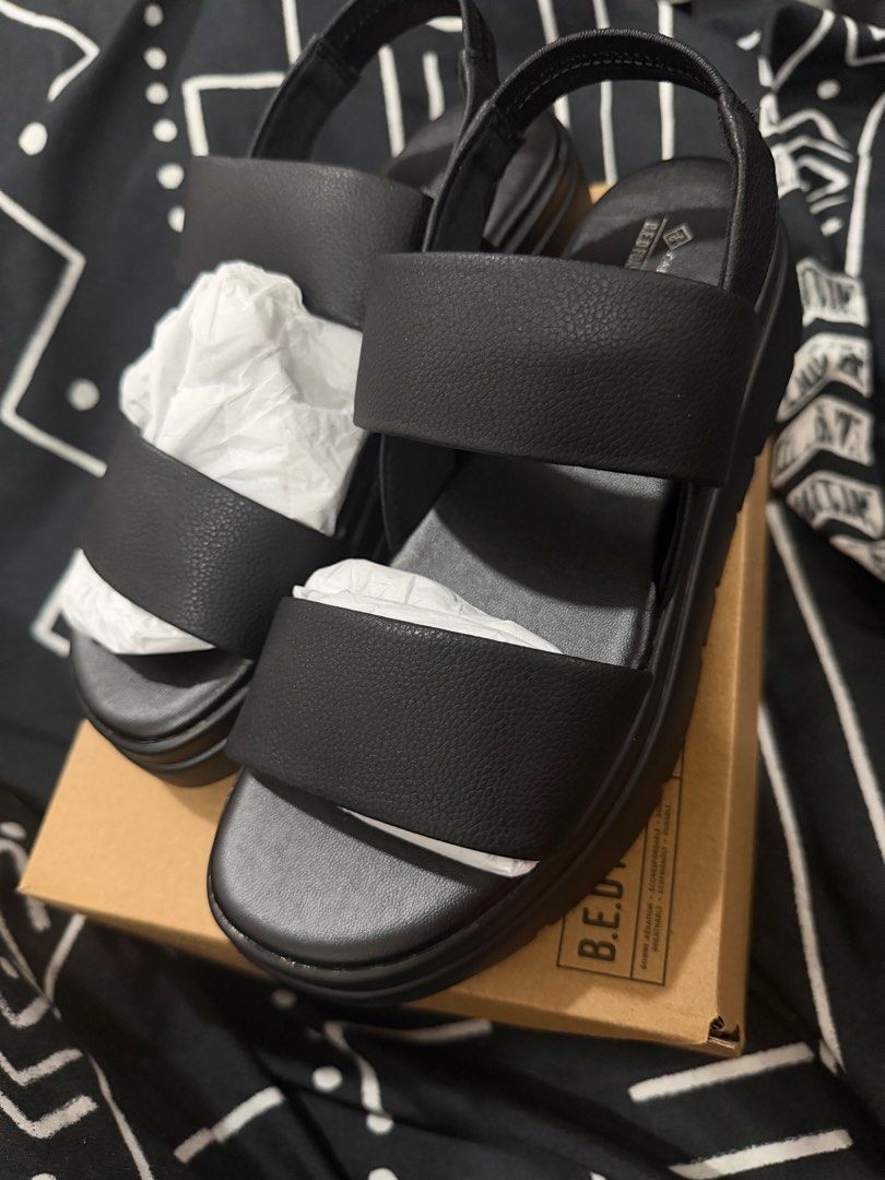 Call It Spring Black Platform Sandals US 7 (Category: Sandals) located in Pasig City. Submitted by hellokittydei (Listing ID 1465995226, Image 1). Description: - Brand: Call It Spring Size Us 7 - Color: Classic Black - Material: Sustainable B.E.D. Foam vegan material - Condition: Brand new, never worn - Design: Two wide straps with a secure back slingback strap - Sole: Chunky ribbed sole for extra grip and comfort - Packaging: Original box includ