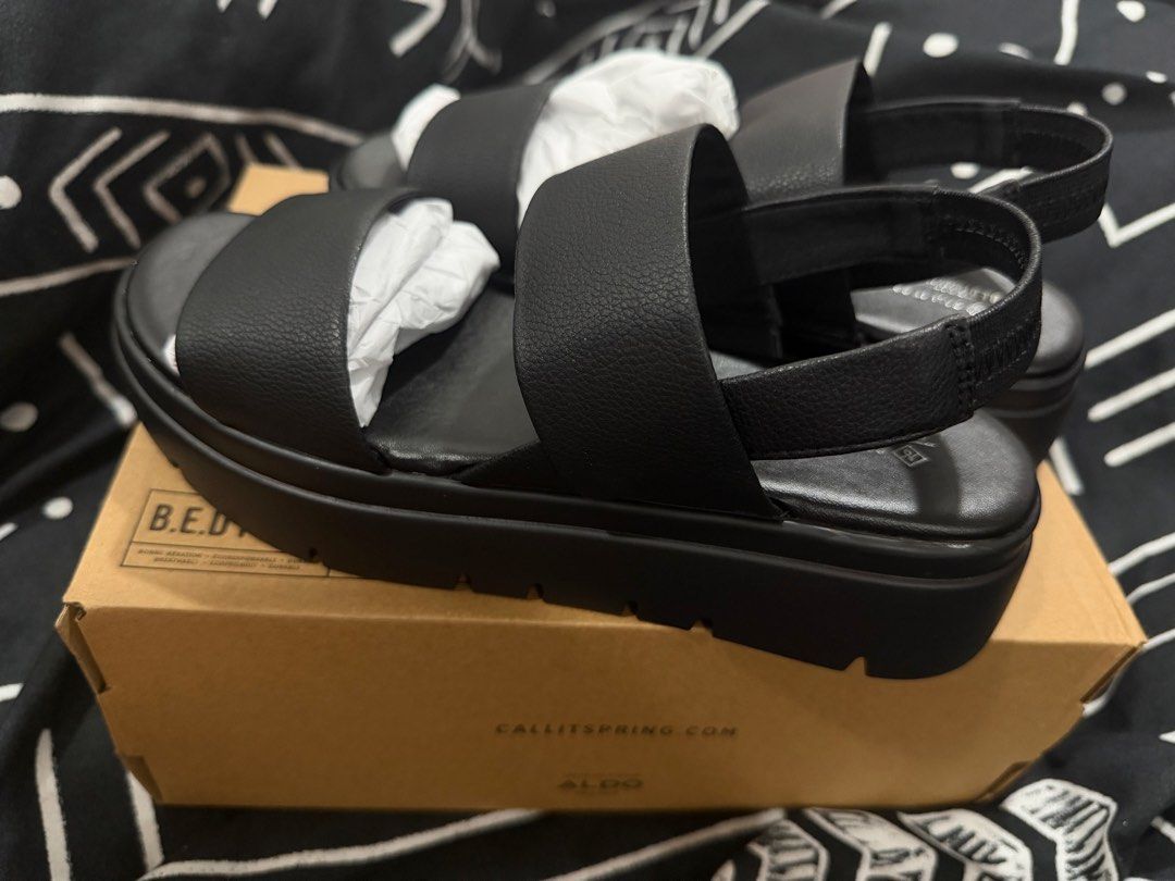 Call It Spring Black Platform Sandals US 7 (Category: Sandals) located in Pasig City. Submitted by hellokittydei (Listing ID 1465995226, Image 2). Description: - Brand: Call It Spring Size Us 7 - Color: Classic Black - Material: Sustainable B.E.D. Foam vegan material - Condition: Brand new, never worn - Design: Two wide straps with a secure back slingback strap - Sole: Chunky ribbed sole for extra grip and comfort - Packaging: Original box includ