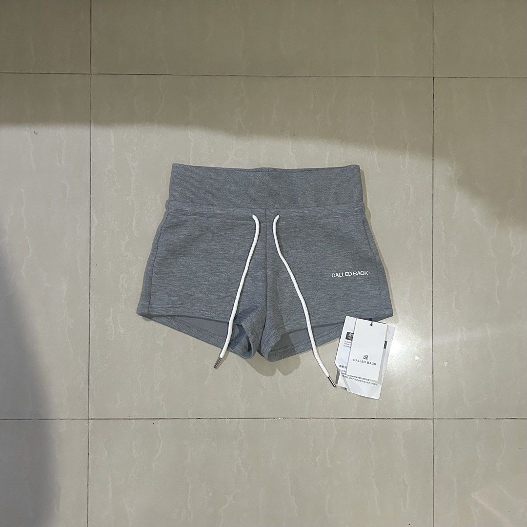 CALLED BACK Grey Athletic Shorts XS (Category: Activewear) located in San Fernando. Submitted by thrift_lang_ni_kim (Listing ID 1466097966, Image 1). Description: - Brand: CALLED BACK - Style/Model: CB240808 - Size: XS - Condition: Brand new with original store tags attached - Color: Grey - Features: High ribbed waistband, white drawstring cords with branded metal aglets, and small white front logo text.