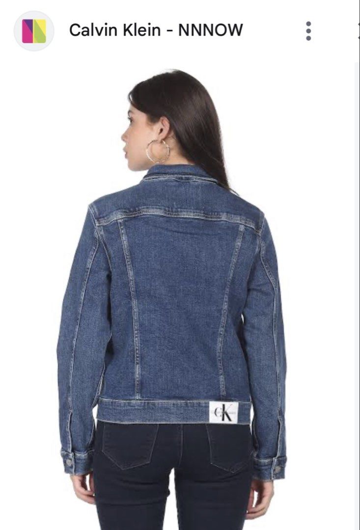 Calvin Klein Jeans Denim Jacket (Category: Coats, Jackets and Outerwear) located in Rizal. Submitted by shoppables (Listing ID 1466000128, Image 2). Description: - Brand: Calvin Klein Jeans - Color: Classic Blue - Material: Durable cotton denim with contrast stitching - Design: Button-up front, two chest flap pockets, and side welt pockets - Details: Iconic CK logo patch on the lower back hem - Fit: Versatile layering piece perfect for daily wear