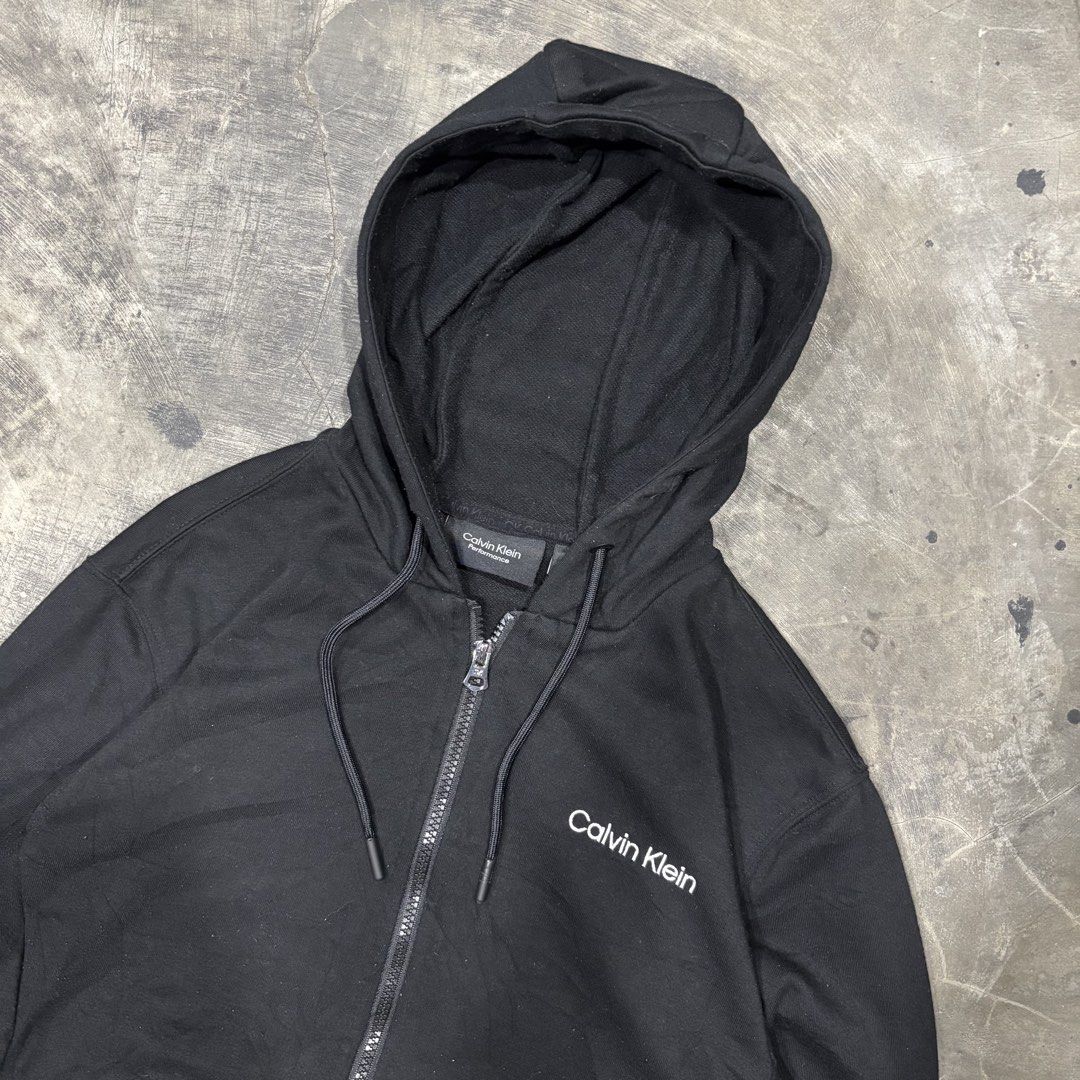 Calvin Klein Zip Up Hoodie (Category: Coats, Jackets and Outerwear) located in General Santos City (Dadiangas). Submitted by rags2reviveph (Listing ID 1466065878, Image 2). Description: Calvin Klein Zip Up Hoodie Medium width 20 | length 26 Excellent.