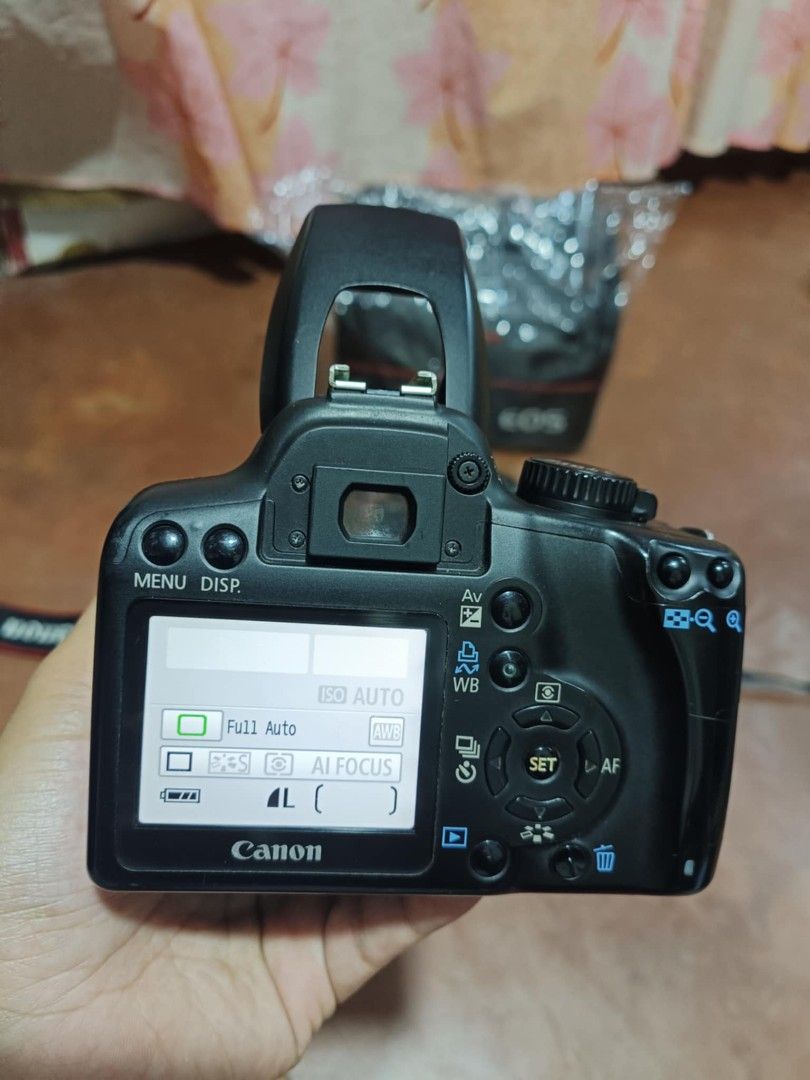 Canon 1000d with 18-55mm lens (Category: Cameras) located in Caloocan City. Submitted by mr.carlo_dslr_laptop (Listing ID 1466010863, Image 3). Description: Canon 1000d For Photos Only DSLR Camera Slightly Used Good Condition 8,000 Pesos 8k Cash 8000 PHP Complete Accesories Memory card Camera Bag Charger and Battery Camera Strap Canon Lens Cap Canon 1000d Body Canon 18-55mm Lens No issue Good Condition Working Autofocus Working Flash All Buttons 