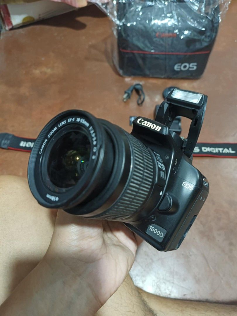 Canon 1000d with 18-55mm lens (Category: Cameras) located in Caloocan City. Submitted by mr.carlo_dslr_laptop (Listing ID 1466010863, Image 1). Description: Canon 1000d For Photos Only DSLR Camera Slightly Used Good Condition 8,000 Pesos 8k Cash 8000 PHP Complete Accesories Memory card Camera Bag Charger and Battery Camera Strap Canon Lens Cap Canon 1000d Body Canon 18-55mm Lens No issue Good Condition Working Autofocus Working Flash All Buttons 