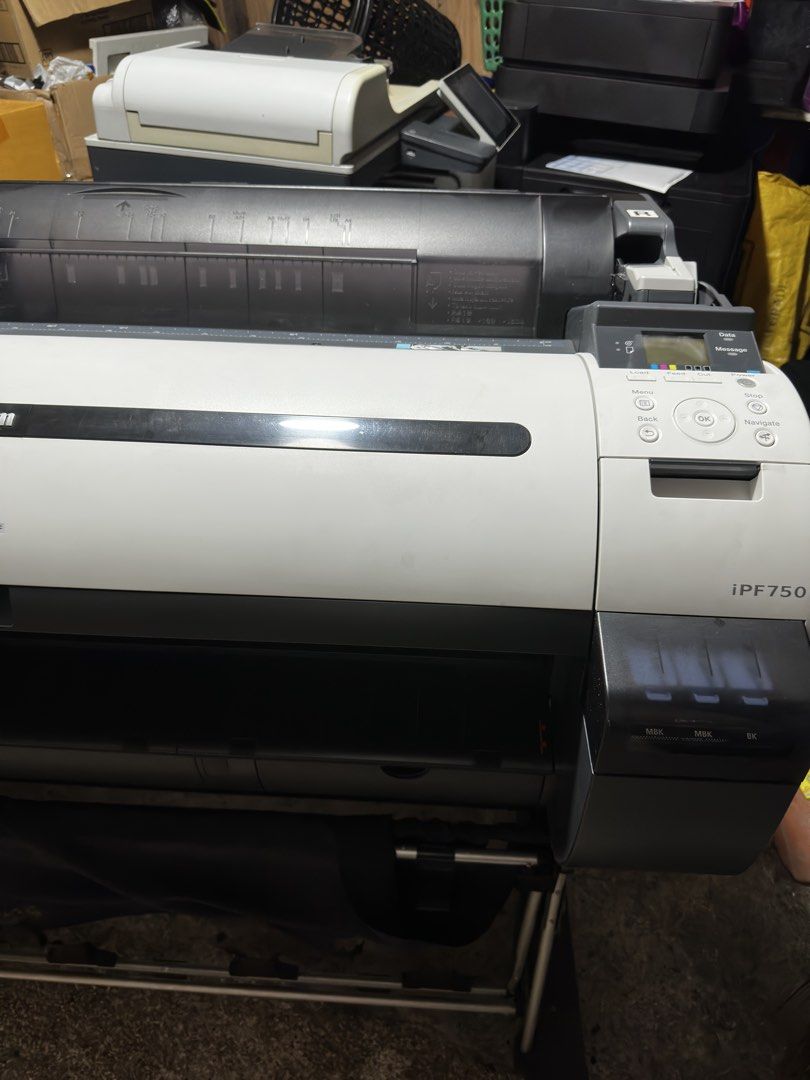Canon imagePROGRAF iPF750 Large Format Printer (Category: Printers, Scanners & Copiers) located in Makati City. Submitted by jtechs (Listing ID 1466055980, Image 1). Description: - Canon imagePROGRAF iPF750 Plotter Printer 36inches - Ideal for large technical drawings and posters - User-friendly control panel with LCD display - Equipped with MBK, MBK, and BK ink tanks - Includes a convenient multi-roll feed system - Comes with a sturdy stand unde