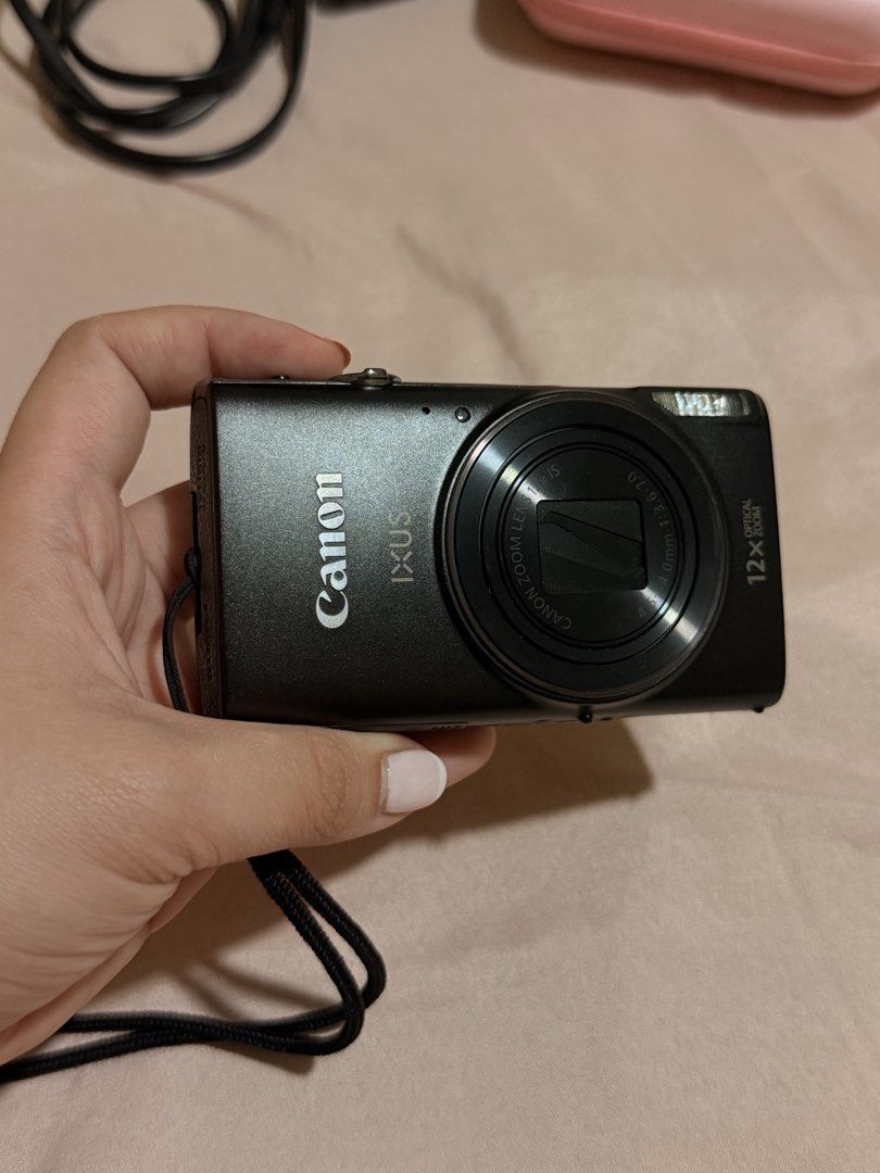 Canon IXUS 285 HS A Digital Camera (Category: Cameras) located in Balanga. Submitted by nikkicells (Listing ID 1466027220, Image 2). Description: Canon IXUS 285 HS (Black) - Condition: Fully boxed set, ready for use, like new! - Inclusions: Original box, battery charger, and power cable - Freebies: Black protective silicone case and pink hard zipper pouch. Installed screen protector (since Day 1!) - Current market price for bnew is 22998 Bought t