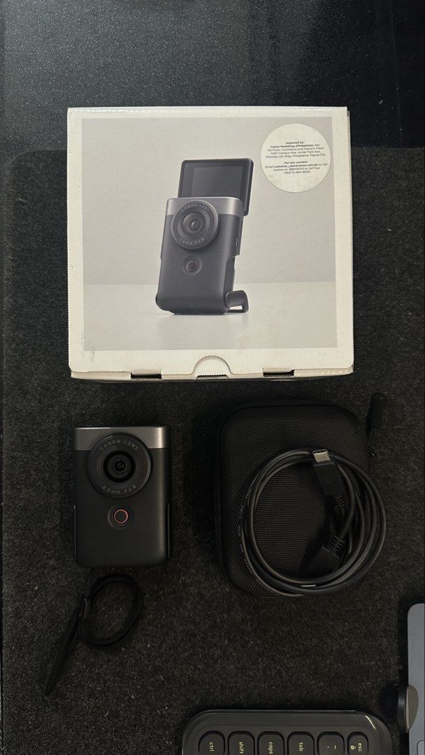 Canon PowerShot V10 Vlogging Camera (Category: Cameras) located in Quezon City. Submitted by jang08 (Listing ID 1466151834, Image 1). Description: Almost bnew camera just bought it last May 2026 Price nego if meetup is within the area Inclusions: • Canon PowerShot V10 Unit • Original Box • Camera Bag • Hand Strap • Sandisk 32gb Memory Card • Tempered screen since day 1 Body condition: • 20.9MP CMOS Sensor • 4K UHD Video Recording • 19mm Wide-Angl