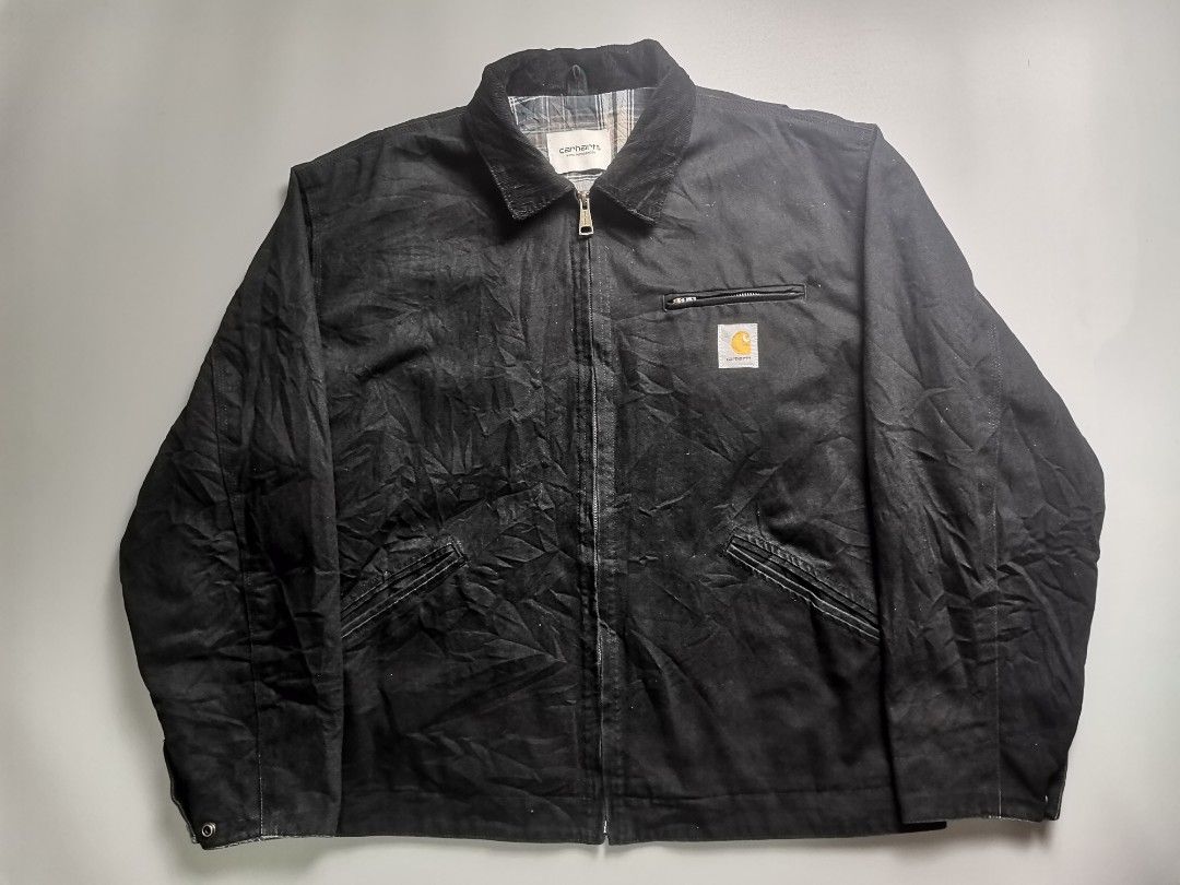 Carhartt Work in Progress Black Detroit Jacket (Category: Coats, Jackets and Outerwear) located in Tacloban City. Submitted by azthrifting24 (Listing ID 1465983166, Image 1). Description: - Brand: Carhartt Work in Progress (WIP) - Color: Black canvas with blue and grey flannel lining - Details: Classic corduroy collar, metal zip closure with workwear pull tab - Pockets: Zipped chest pocket with white logo patch, plus two slanted hand pockets - Cu