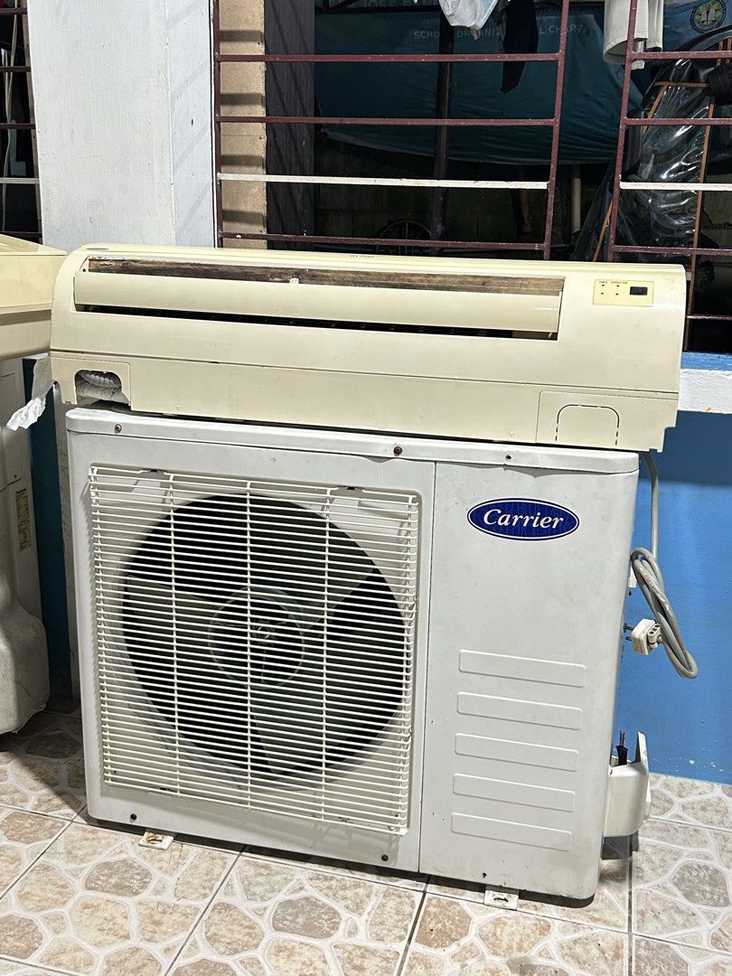 Carrier Split Type Air Conditioner 2.5 HP (Category: Air Conditioning and Heating) located in San Fernando. Submitted by dcdaisyyy (Listing ID 1466009929, Image 1). Description: - split type air conditioner set (indoor wall unit and outdoor condenser included) - Standard white casing - Shows visible dust and minor yellowish discoloration due to previous installation and use - Fully functional and ready for pickup or delivery - Feel free to send a
