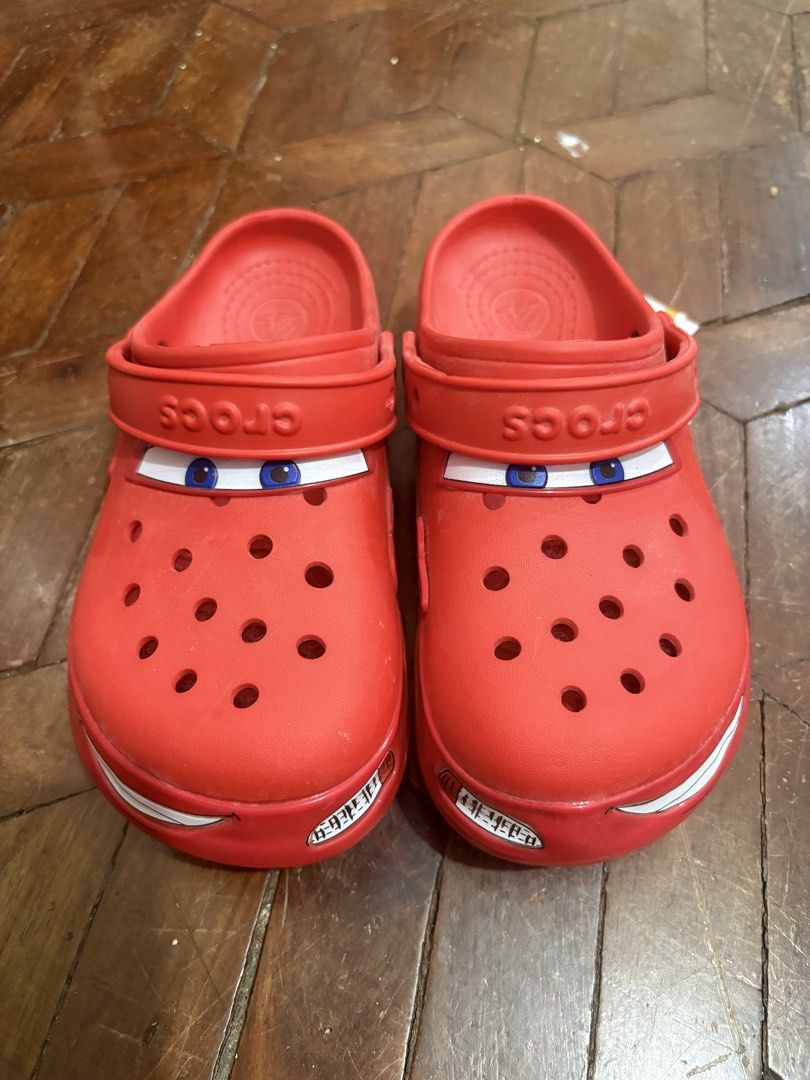 Cars X Crocs (Lightning McQueen) (Category: Babies & Kids Fashion) located in Manila. Submitted by cookie.dokie (Listing ID 1466041171, Image 3). Description: Cars x Crocs ⚡️🏁 Brand new and still with tags — never worn! ✨ 📏 Size: J3 📦 Complete and in great condition 💯 Brand new condition 🏷️ Tags still attached 📍 Location: Bicutan 🛵 Lalamove only — shipping fee c/o buyer. Price: 2000 (negotiable) PM for more inquiries! 😊.