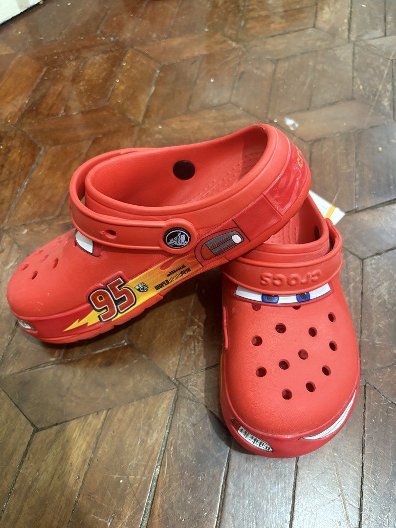 Cars X Crocs (Lightning McQueen) (Category: Babies & Kids Fashion) located in Manila. Submitted by cookie.dokie (Listing ID 1466041171, Image 2). Description: Cars x Crocs ⚡️🏁 Brand new and still with tags — never worn! ✨ 📏 Size: J3 📦 Complete and in great condition 💯 Brand new condition 🏷️ Tags still attached 📍 Location: Bicutan 🛵 Lalamove only — shipping fee c/o buyer. Price: 2000 (negotiable) PM for more inquiries! 😊.